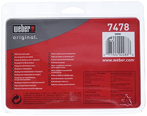 Durable plastic tool hooks on Weber grill handle withstands weather outdoors