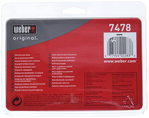 Durable plastic tool hooks on Weber grill handle withstands weather outdoors