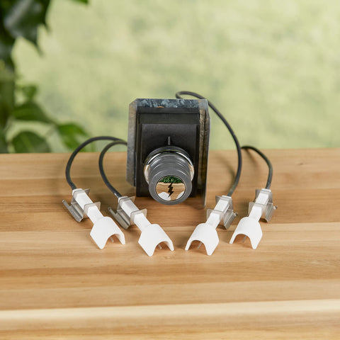 Weber Genesis 330 spark test demonstrates ignition readiness.