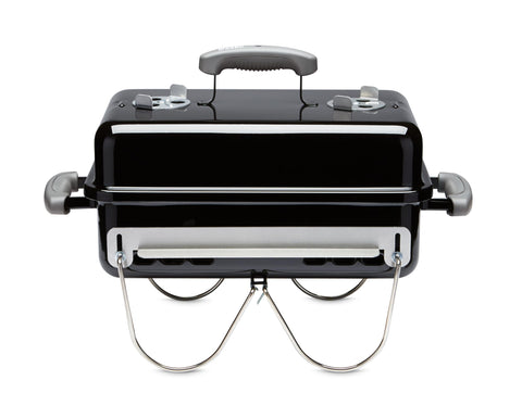 Weber Go-Anywhere grill closed for transport, ideal for camping and travel.