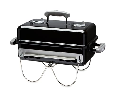 Weber Go-Anywhere grill open with full cooking area ready for meals.