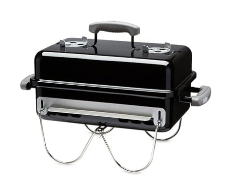 Weber Go-Anywhere grill open with full cooking area ready for meals.