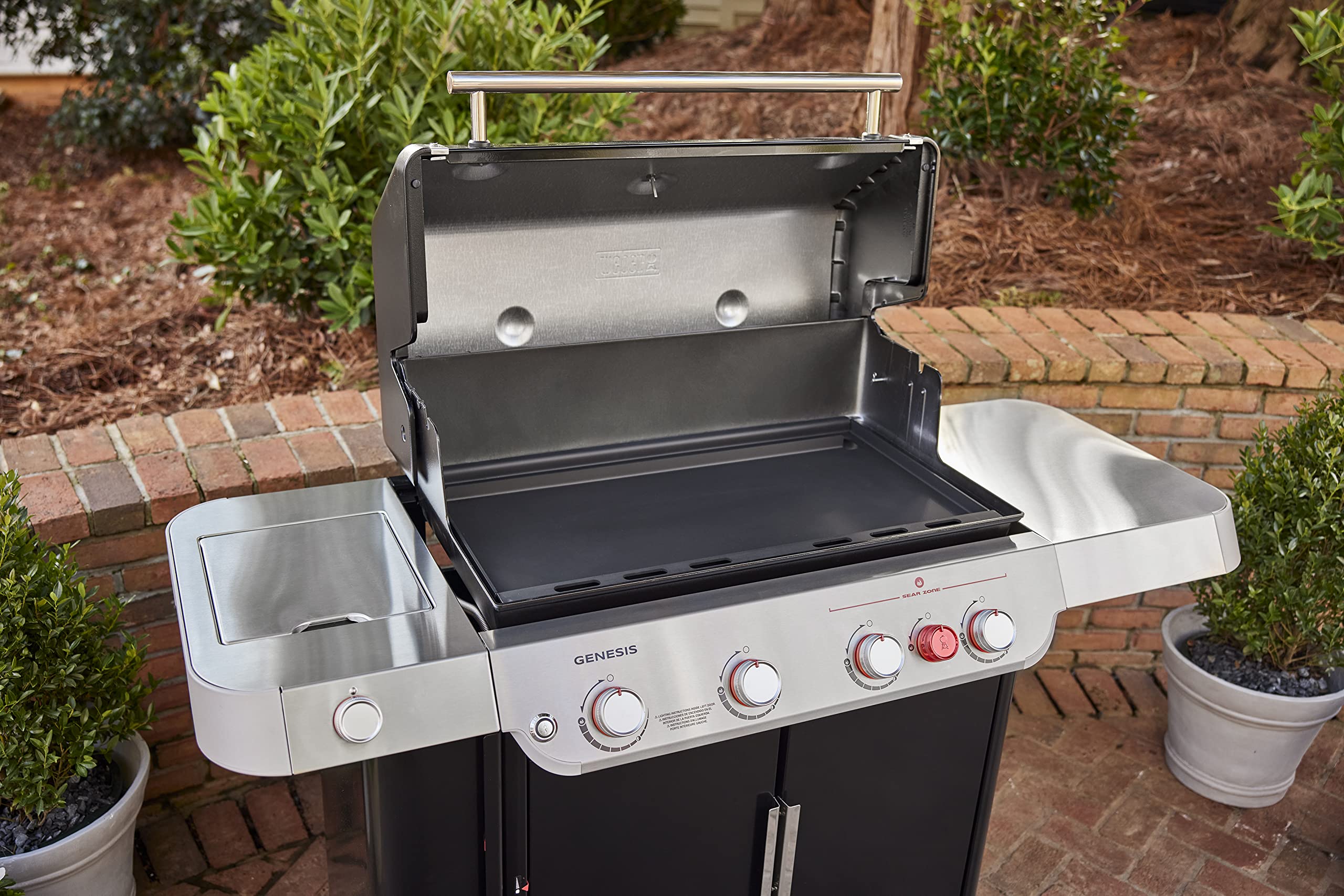 Weber griddle insert rimmed edges keep food and grease in place