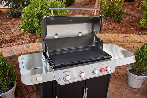Weber griddle insert rimmed edges keep food and grease in place