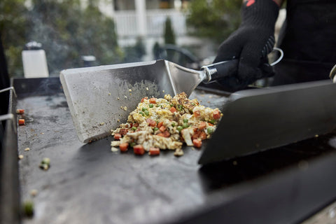 Weber Griddle Spatula suited for smash burgers and outdoor cooking