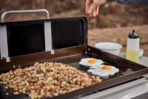 Weber Griddle Starter Smash burgers achieve caramelized onions on the griddle.