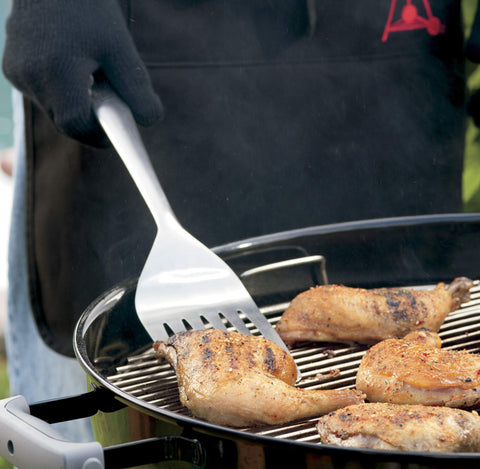 Weber tool set on a grill setup for convenient use