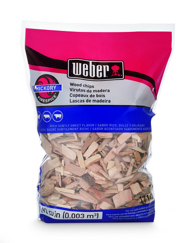 Weber Hickory smoked wood chips bag enhances grilling flavor.