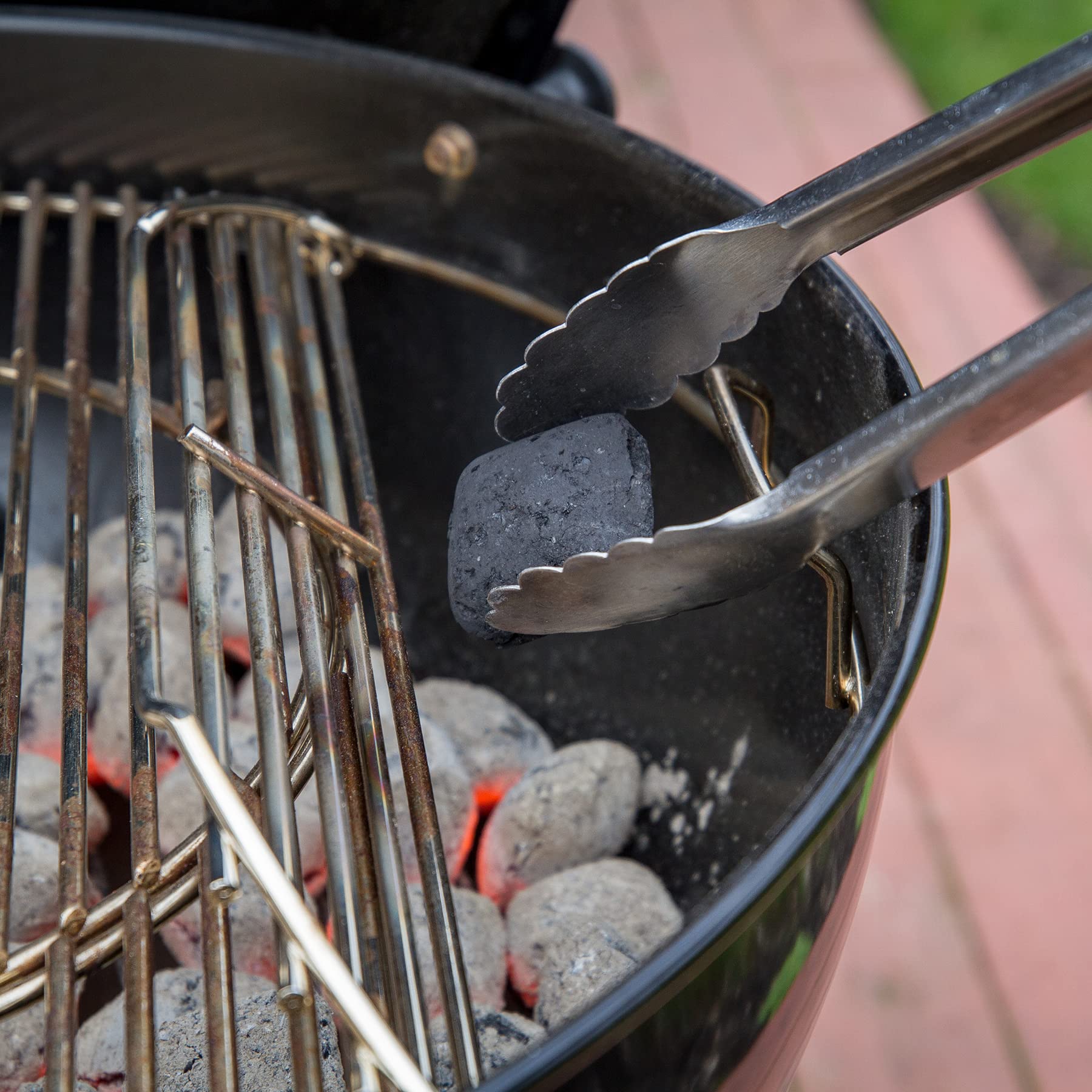 Weber Hinged Cooking Grate closeup plates highlights heavy-duty plated steel surface.