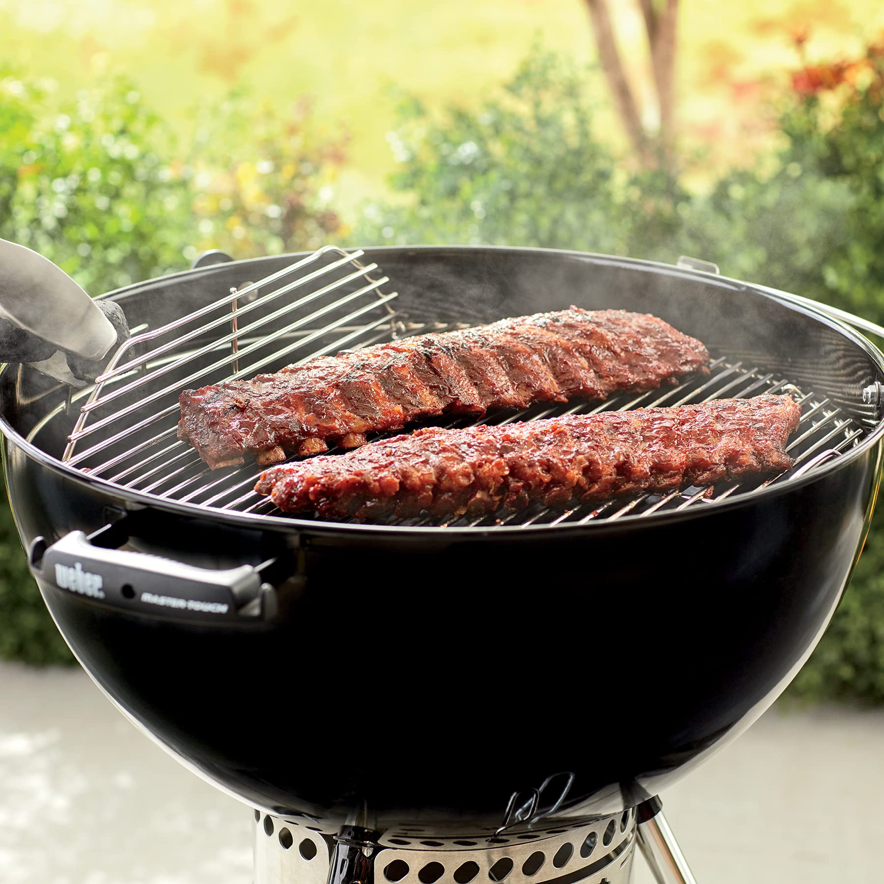 Weber Hinged Cooking Grate easy-clean shows preheat and brush maintenance in action.