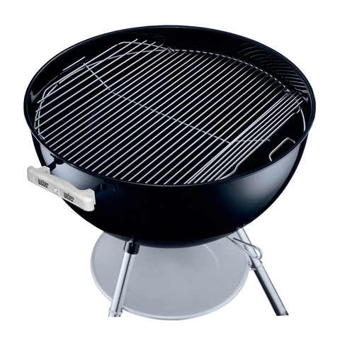 Weber Hinged Cooking Grate side handles enable easy lifting while adding charcoal.