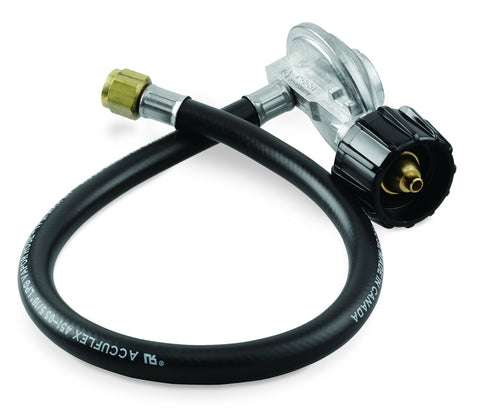 Weber hose and regulator kit assembly close-up showing secure connection.