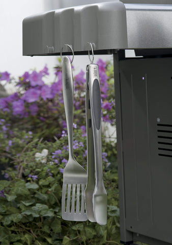 Weber in use on the grill showing balance and control