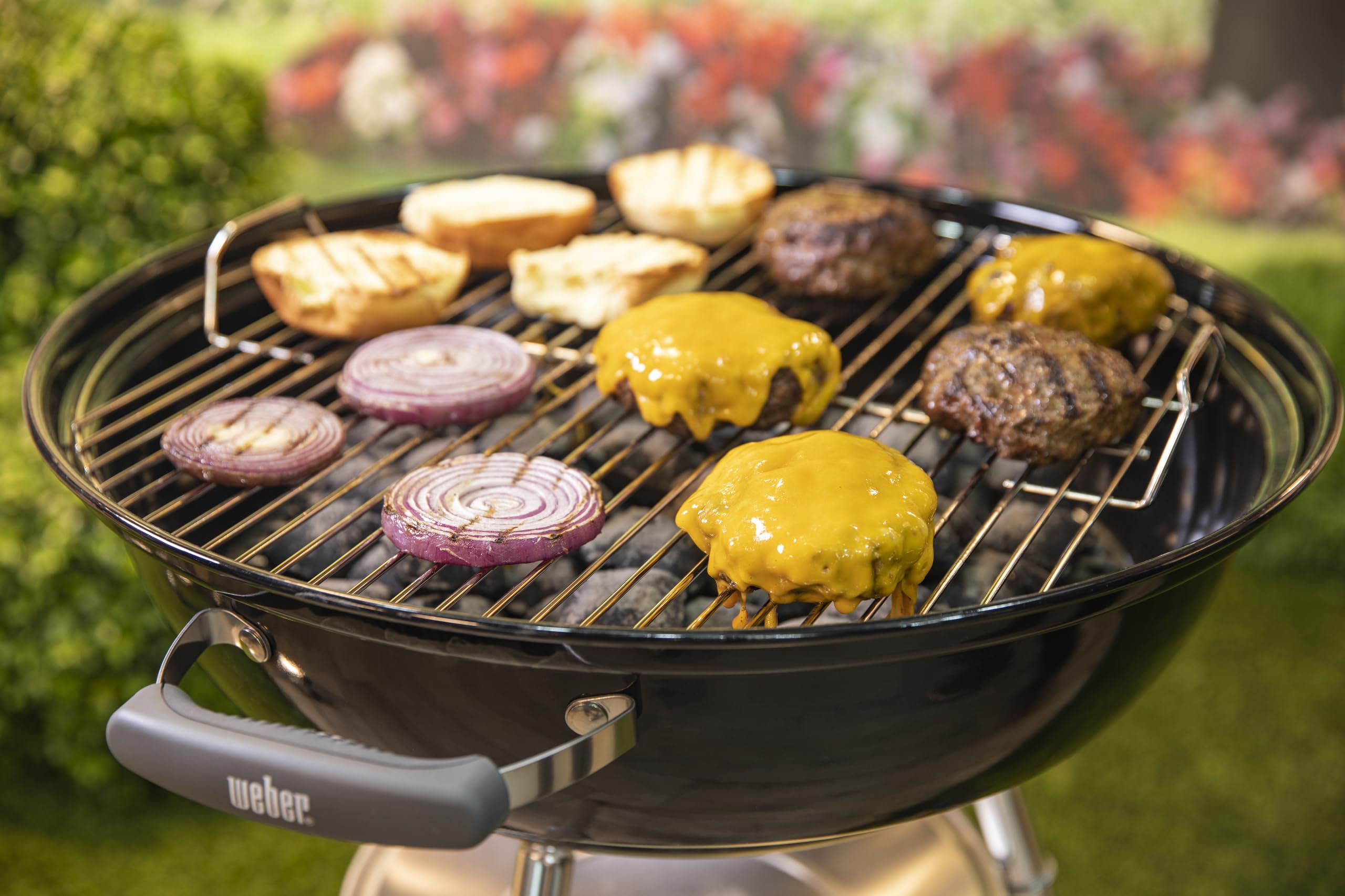 Weber Jumbo Joe aluminum ash catcher simplifies cleanup after grilling
