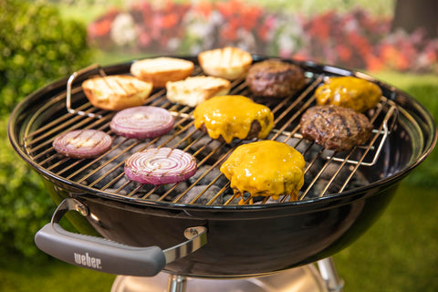 Weber Jumbo Joe aluminum ash catcher simplifies cleanup after grilling