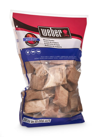 Weber chunks on a grill scene—long-lasting heat for steady smoking.
