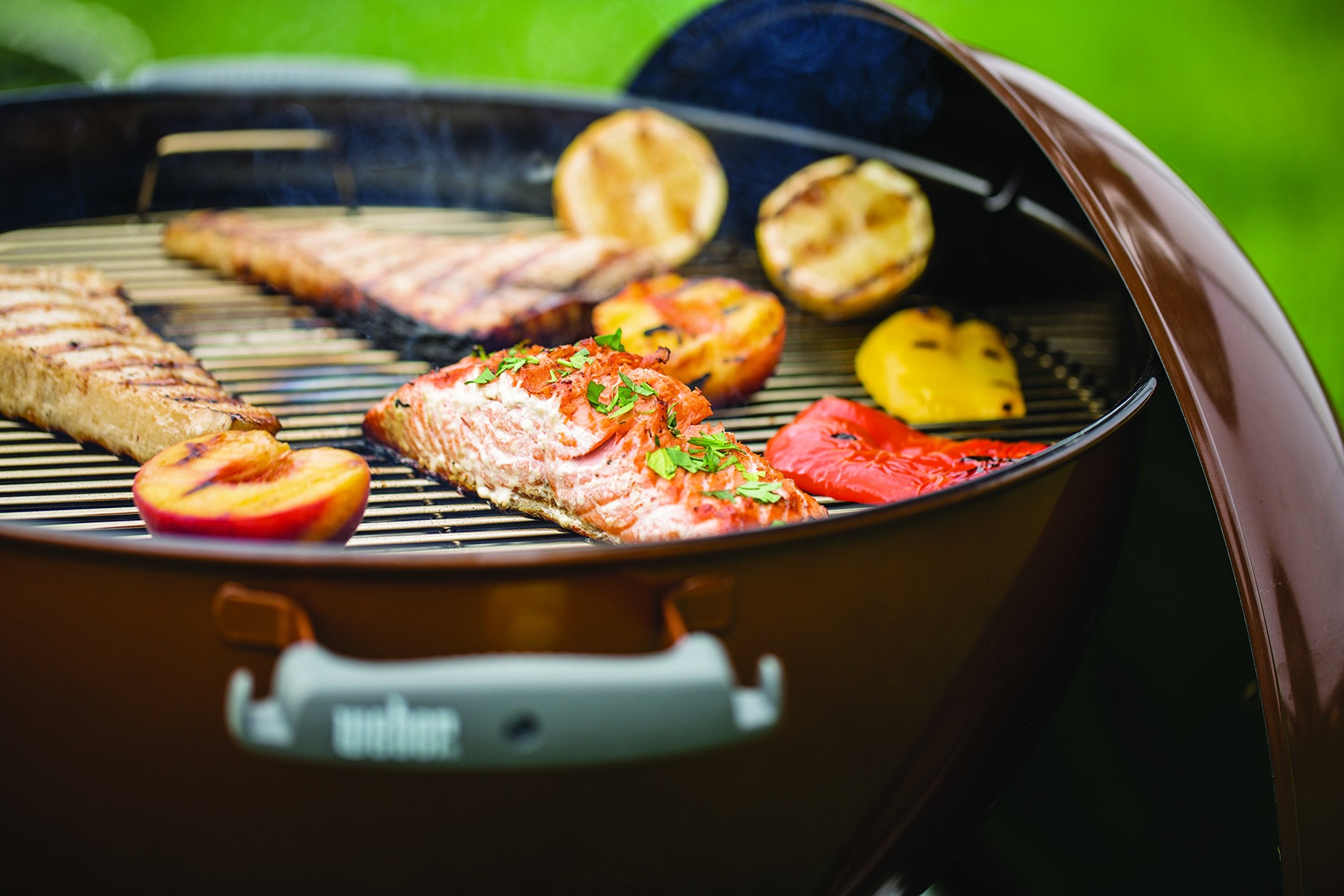 Weber Original Kettle Premium side lid hanger for easy access.