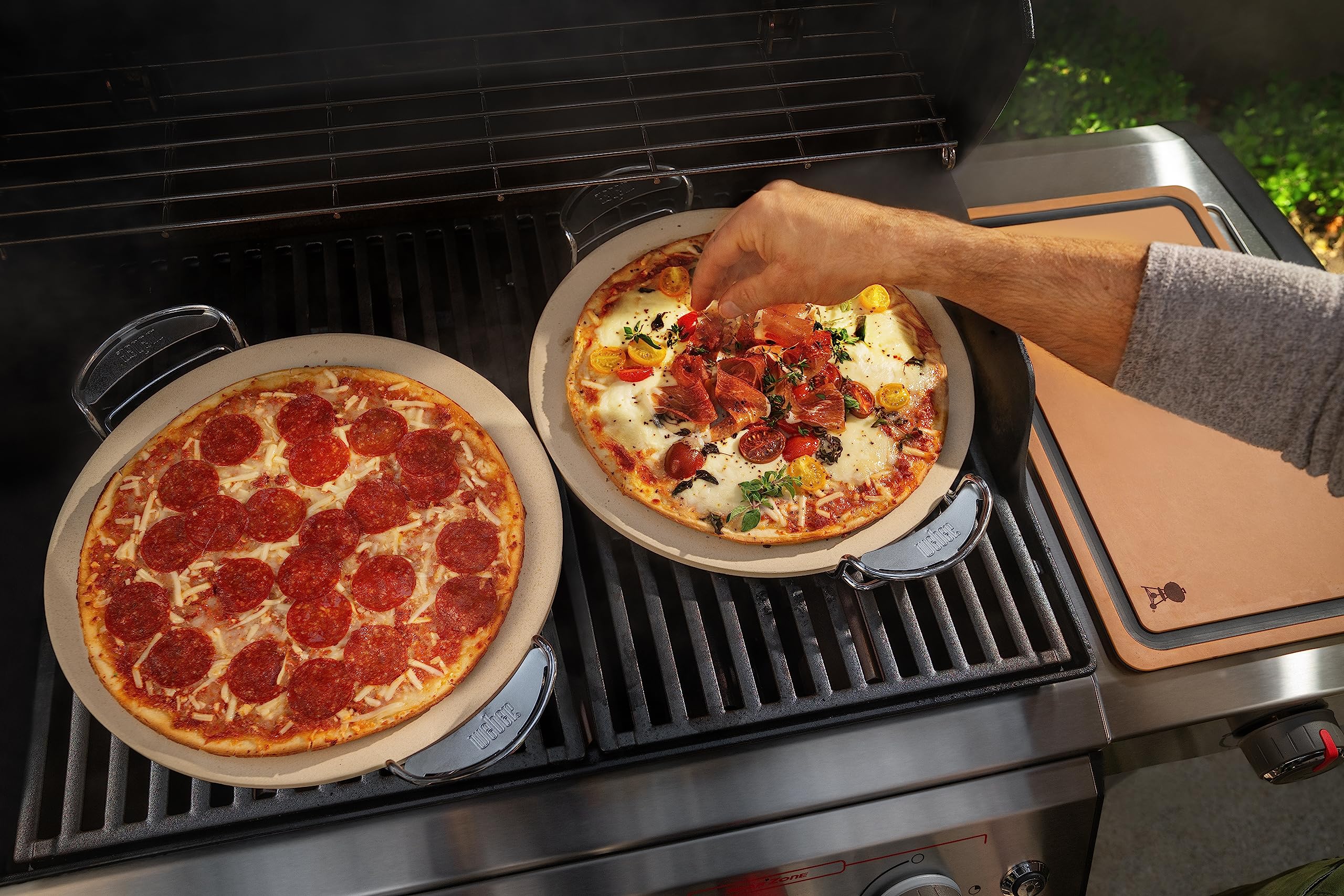 Preheating Weber pizza stone for even cooking on grill