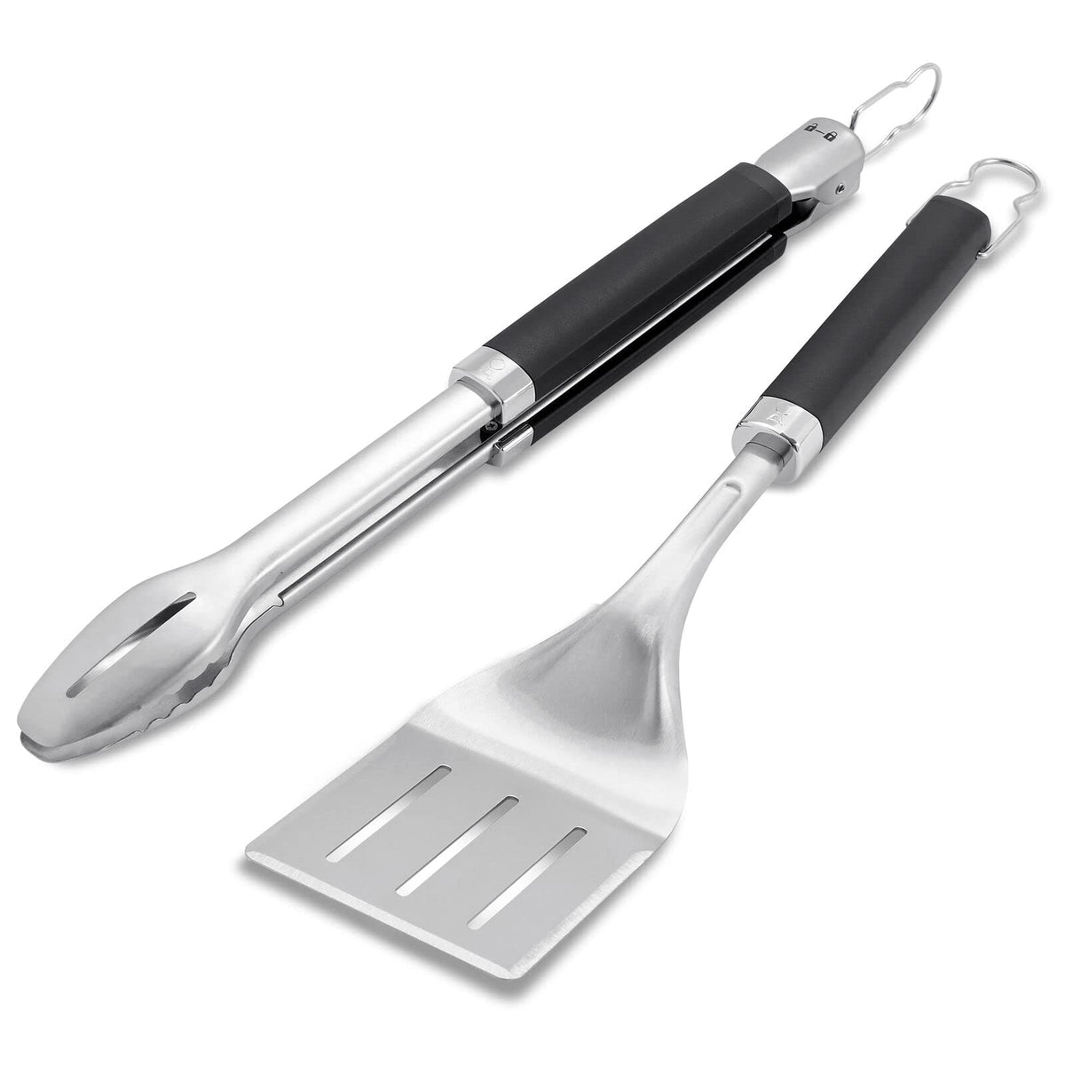 Weber precision tongs and spatula set in use for grilling precision