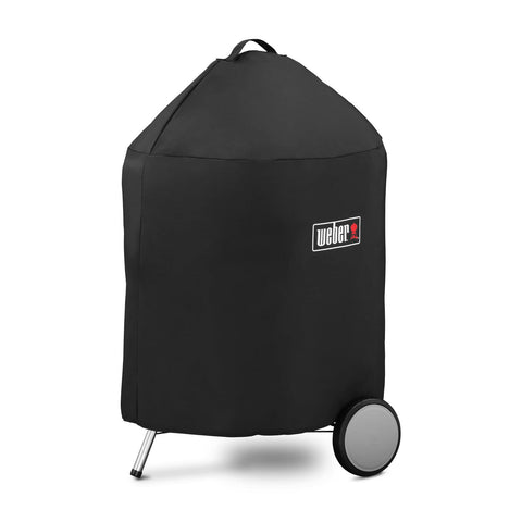 Weber Premium 22-Inch grill cover on grill with UV-resistant protection