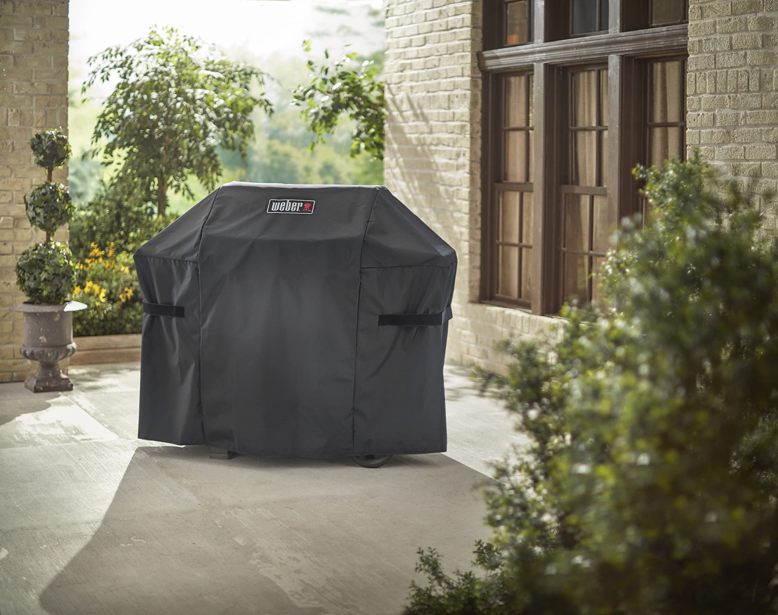 Spot clean only to maintain Weber grill cover appearance across seasons.