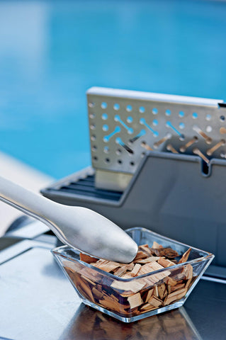 Weber Premium Smoker Box hinged lid for easy chip refills.