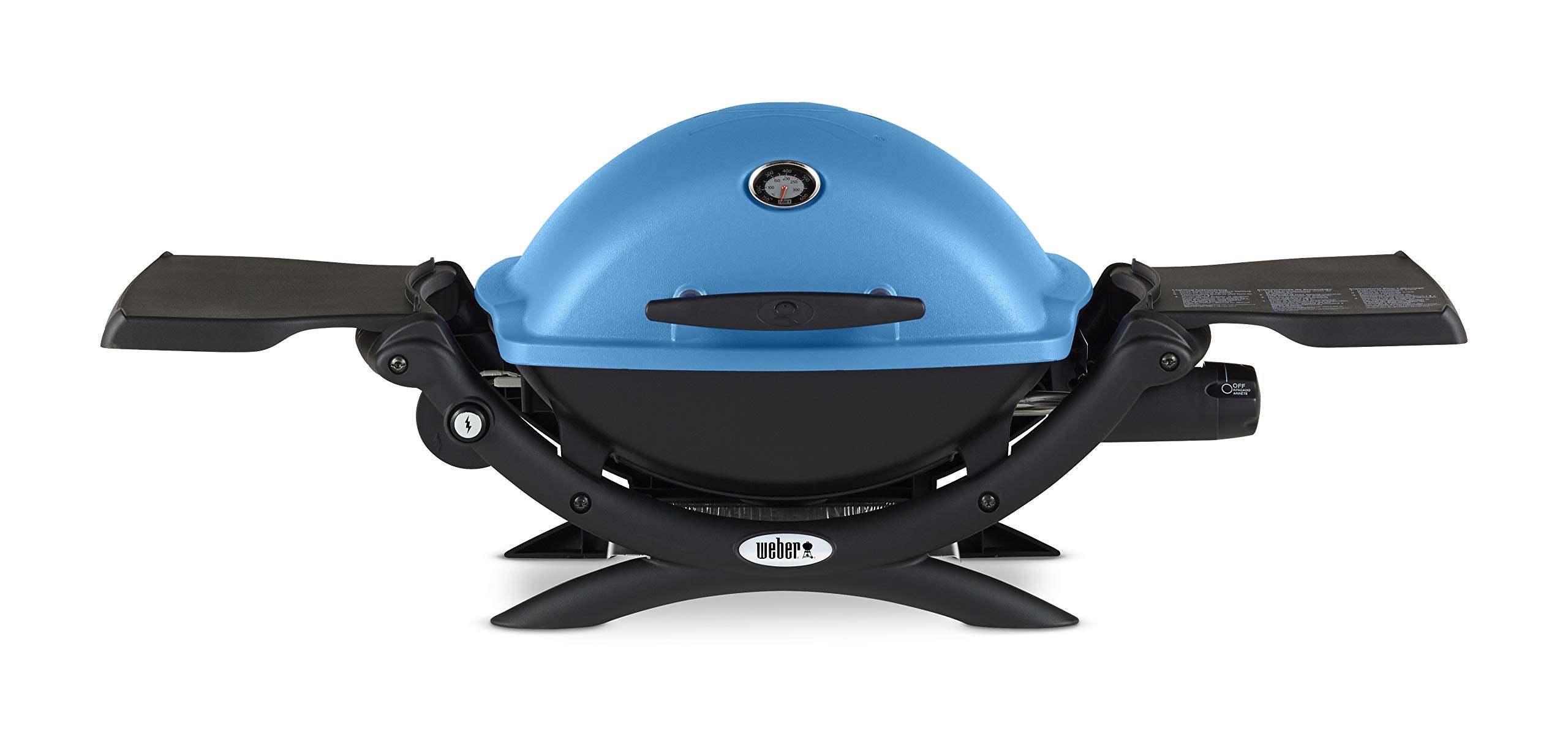 Weber Q1200 blue hood in portable setup for travel grilling.