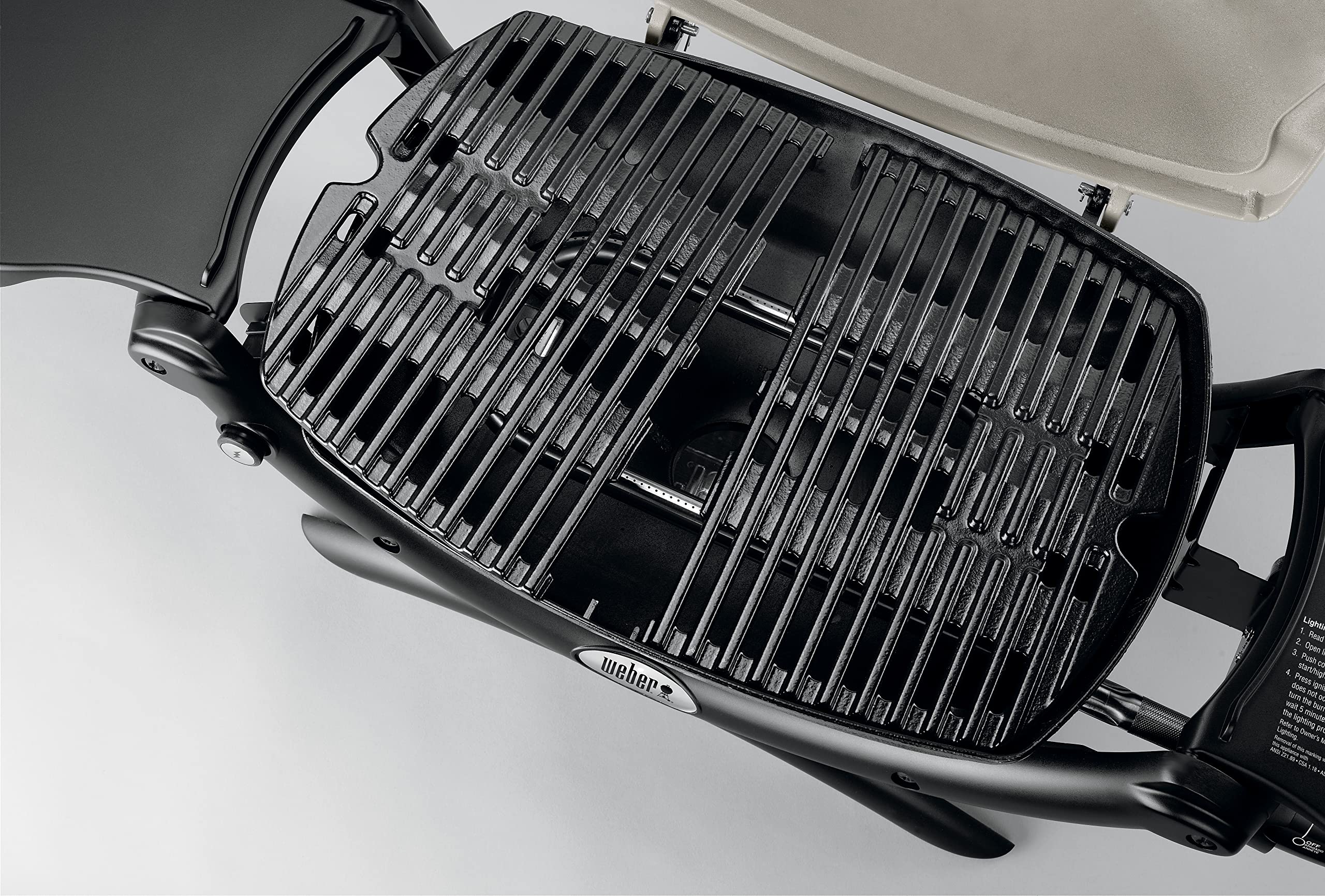 Weber Q1200 durable cast-aluminum lid and cookbox for outdoor use