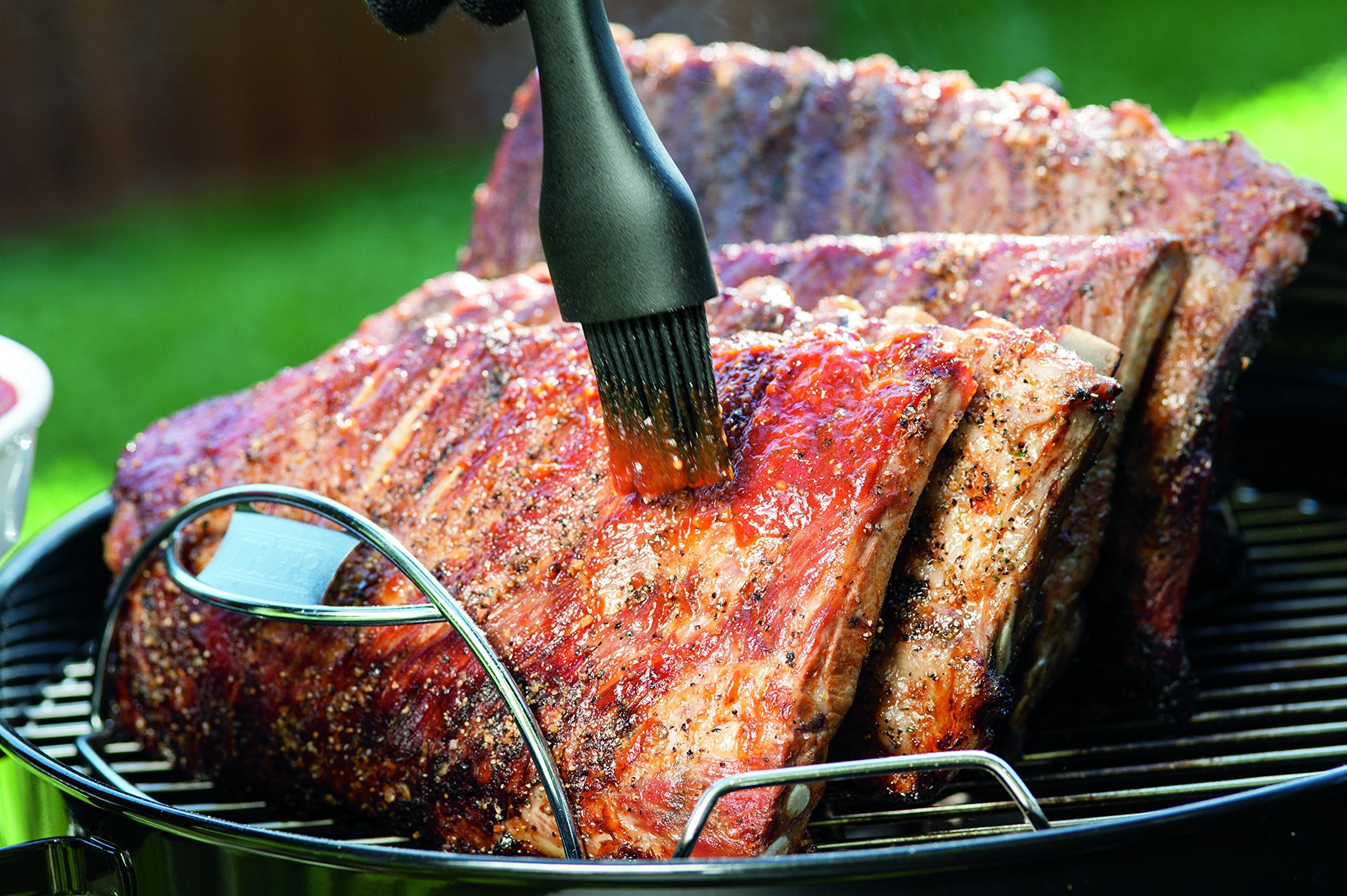 Dishwasher-safe plated steel Weber rib rack for easy cleanup.