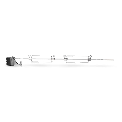 Weber rotisserie forks and hardware installed for secure cooking.