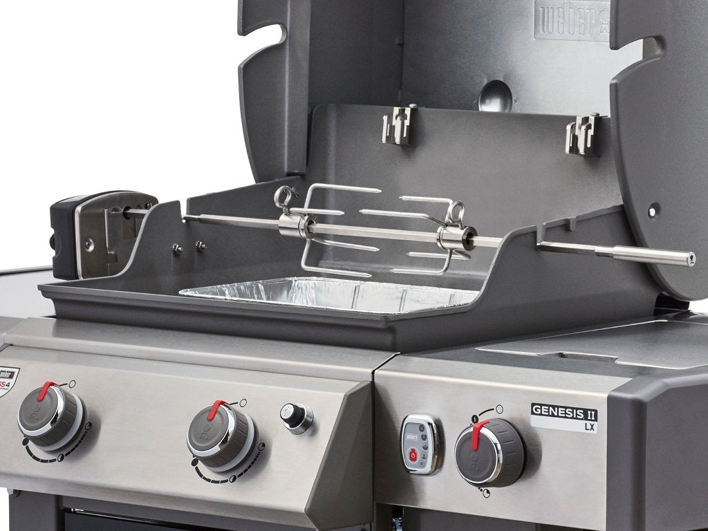 Weber rotisserie installation on Genesis II shows easy grill integration.