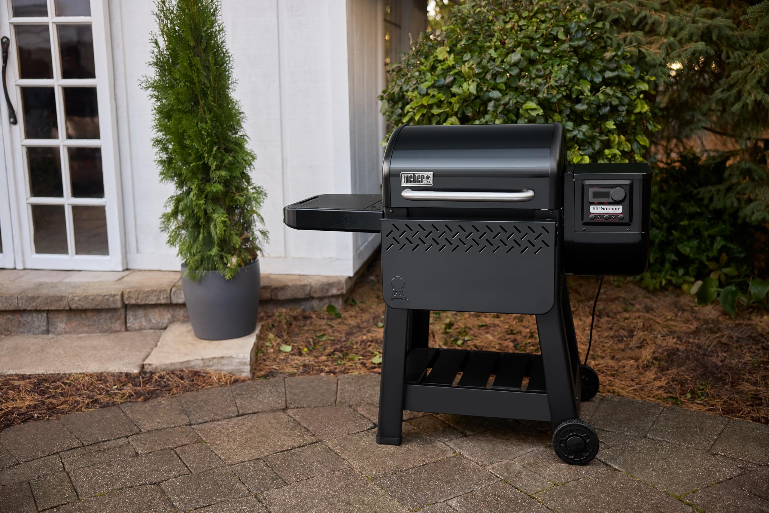 Weber Searwood 600 front table folds down when not in use.