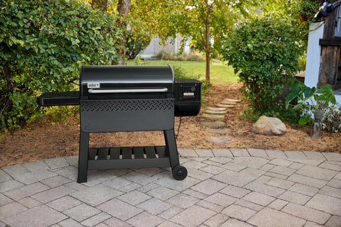 Weber Searwood 600 XL front table folded for compact storage.