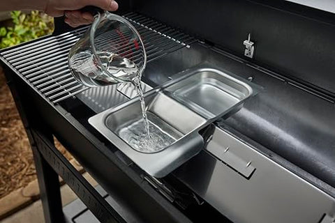 Weber Searwood Wet Smoke Pan under the grate creates indirect heat.