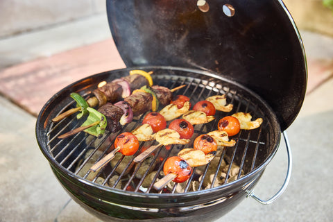 Weber Smokey Joe 14in tailgating setup shows portability and quick grilling.