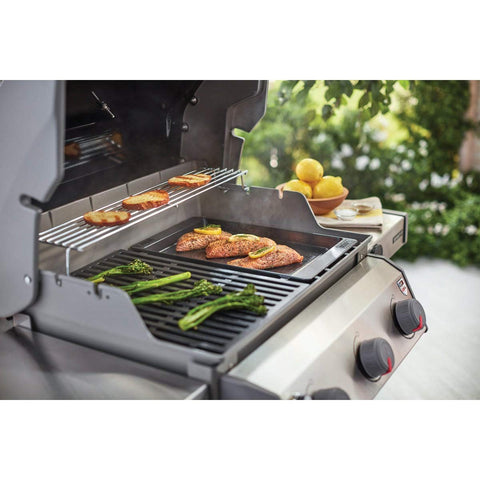 Weber Spirit griddle easy-clean surface after cooking.