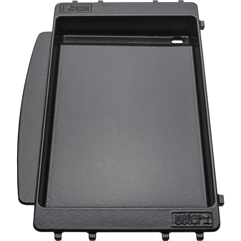Weber Spirit griddle sloped surface directing drippings to grease reservoir.