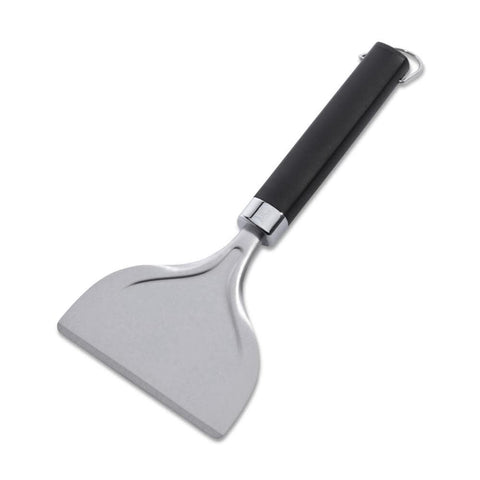 Weber stainless steel griddle scraper close-up showing durable construction for grease removal.