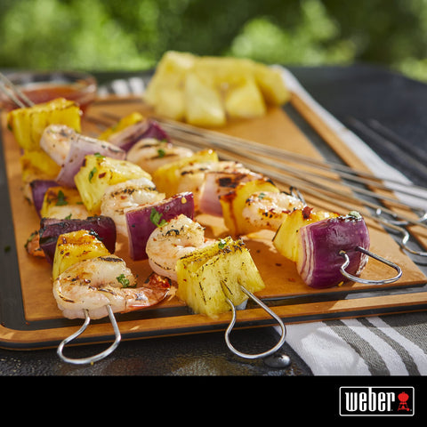 Weber stainless-steel skewers provide secure, rotation-free grilling for veggies and meats.