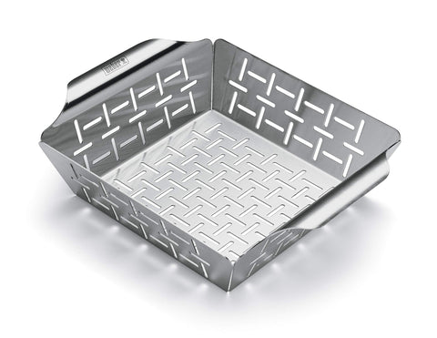 Close-up of Weber stainless steel vegetable basket on grill