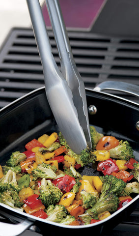Weber textured easy-grip handles provide secure hold
