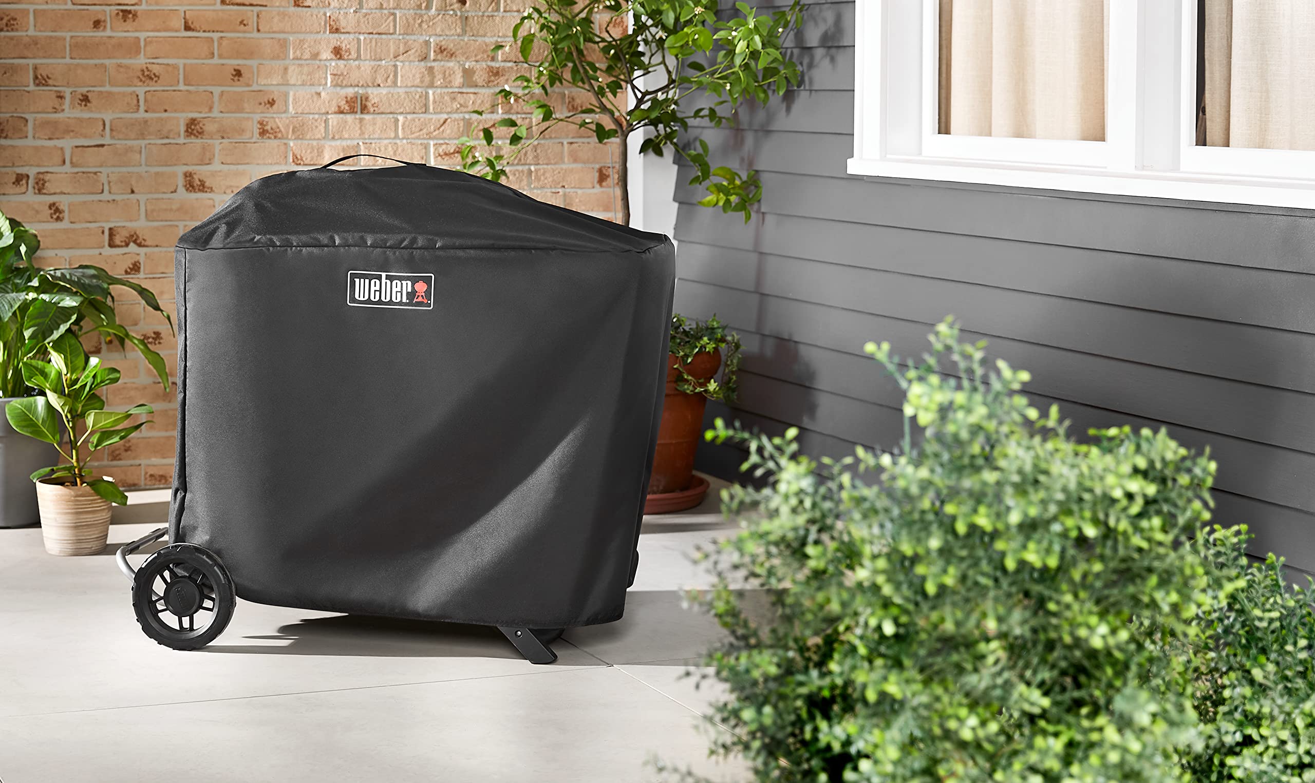 Weber Traveler Premium Cover is ready for camping use with upright fit.