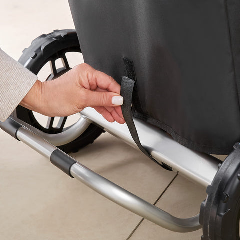 Weber Traveler Premium Cover fits the upright Weber Traveler securely.