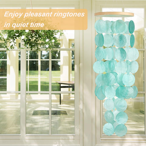 WeDoSoy wind chimes sunlight through shells creates mesmerizing light and shadow patterns.