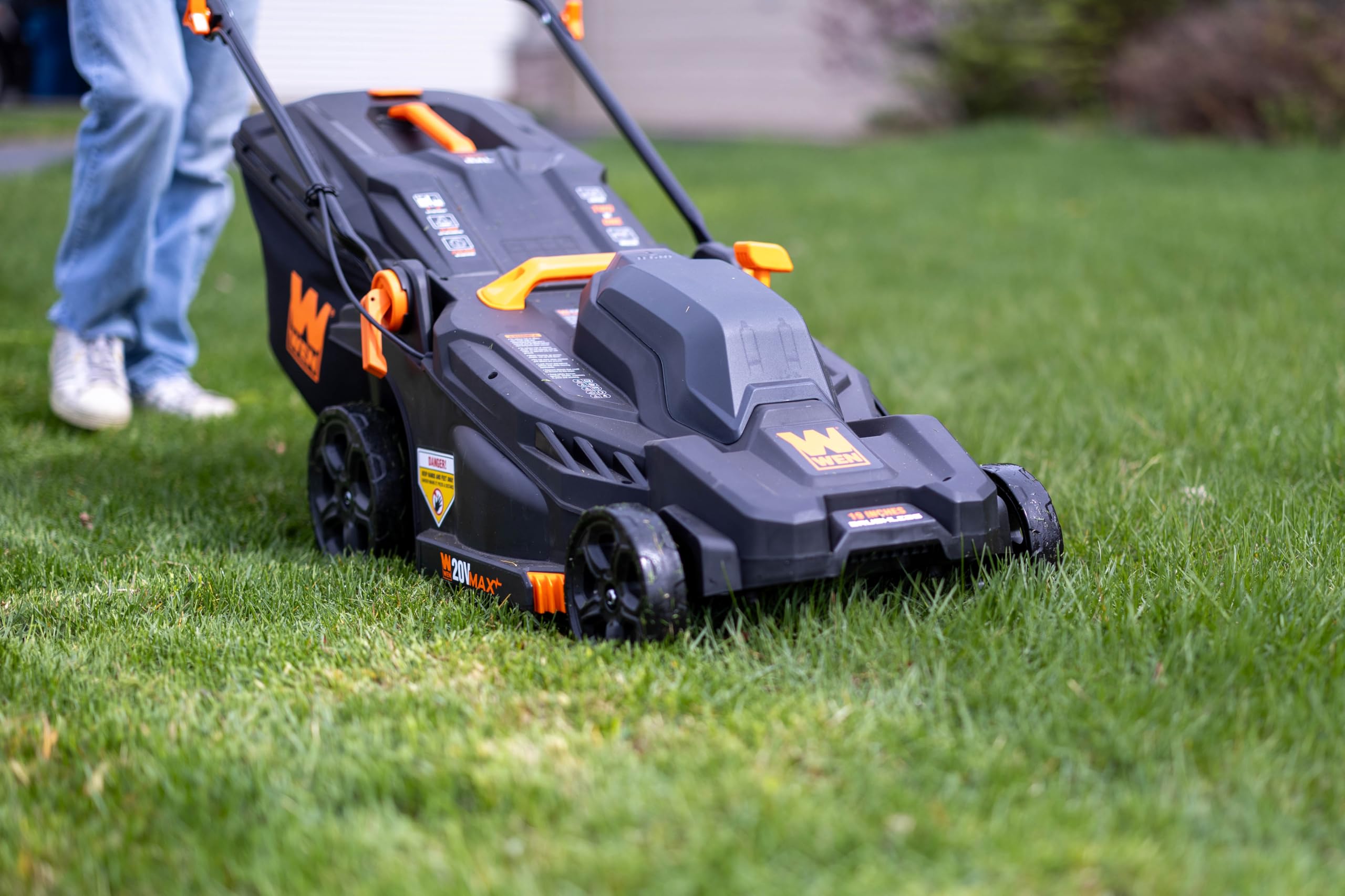 WEN 20V Max 2-in-1 mower folded upright for easy storage
