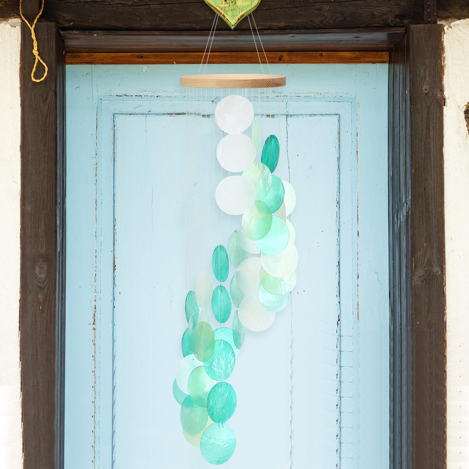 Wenqik wind chime mounted near doorway for welcoming ambiance