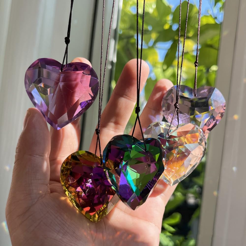 Werdecade suncatcher hanging in garden sparkling under sunlight