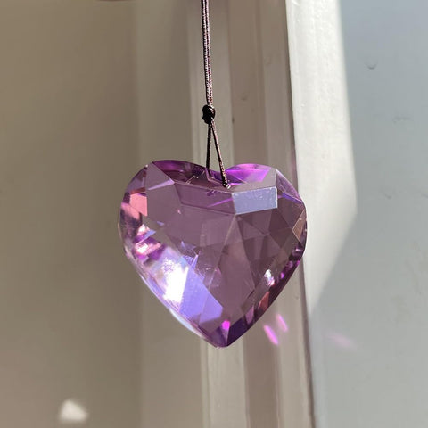 Werdecade heart crystal suncatcher used as wedding decor