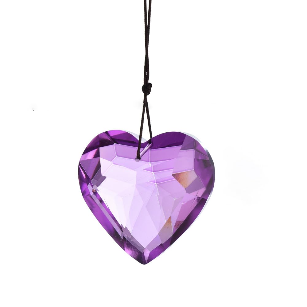 Werdecade colorful heart crystal suncatcher in a window casting rainbow light