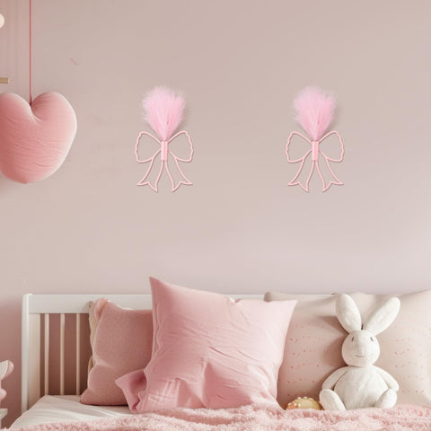 Weysat nursery decor in pink bow style for a playful vibe.